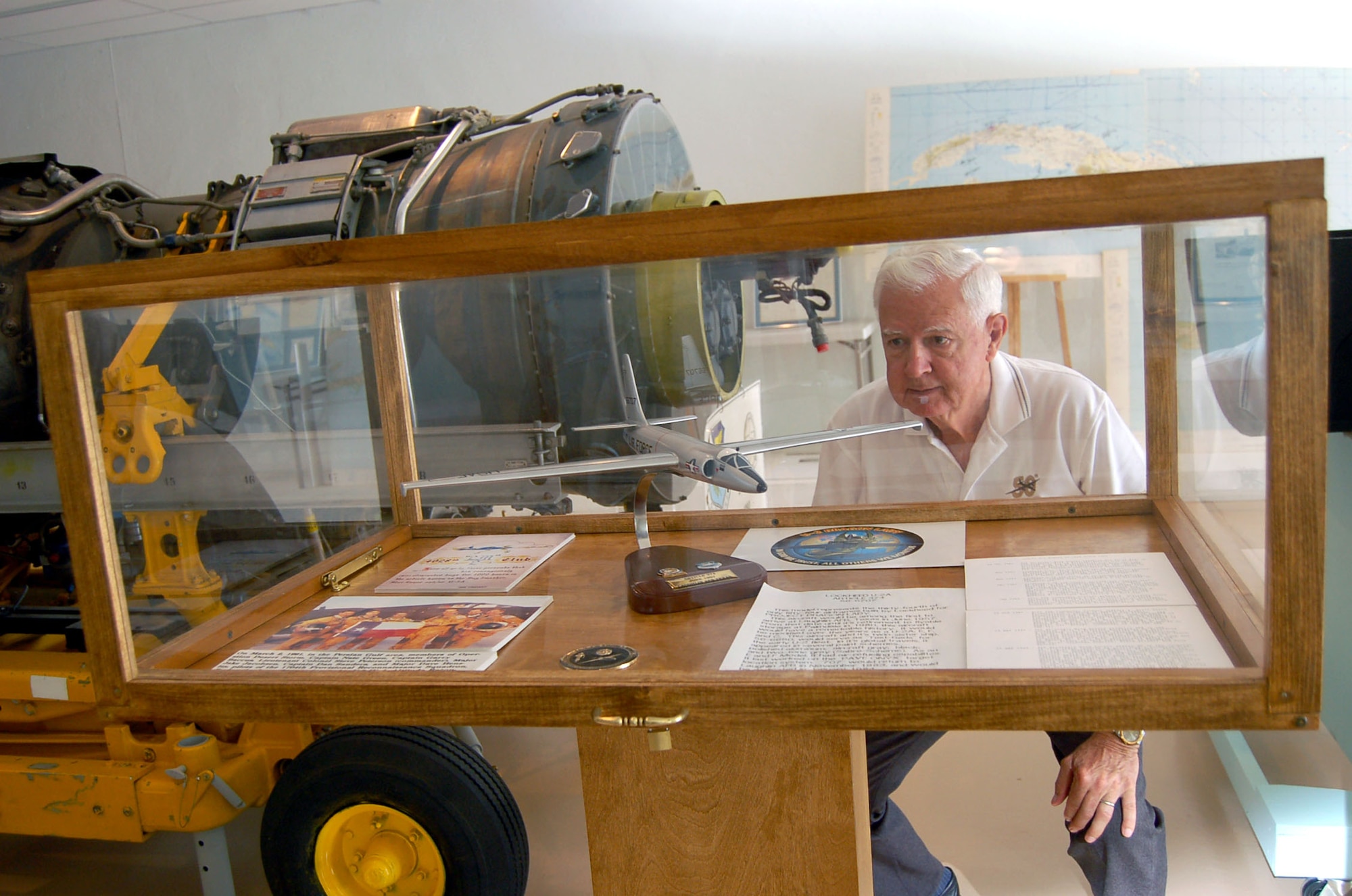 Retired Air Force Col. Victor Milam inspects a U-2 display case at the Laughlin Heritage Foundation Museum in Del Rio, Texas, on Tuesday, June 27. The museum has been open for six months and is run by volunteers. Colonel Milam is treasurer of the Laughlin Heritage Foundation and a retired U-2 pilot. (U.S. Air Force photo/Staff Sgt. Jeremy Larlee) 
