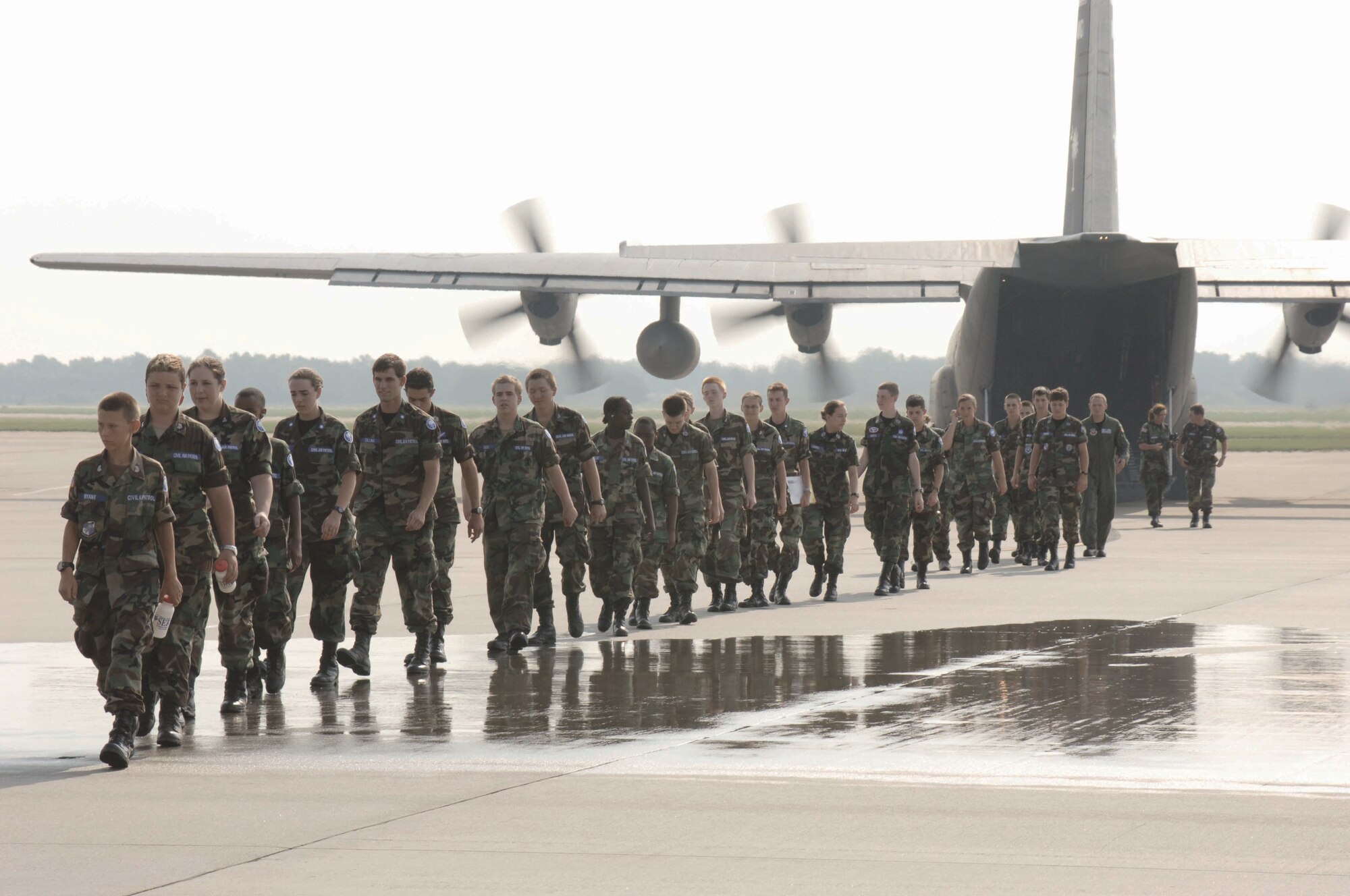 South Carolina Civil Air Patrol members disembark from a C-130 flight Wednesday.  Other members of the CAP received a flight aboard a C-17.  The flights were in addition to a base-wide tour.  (U.S. Air Force Photo/Airman 1st Class Katherine Dodd)