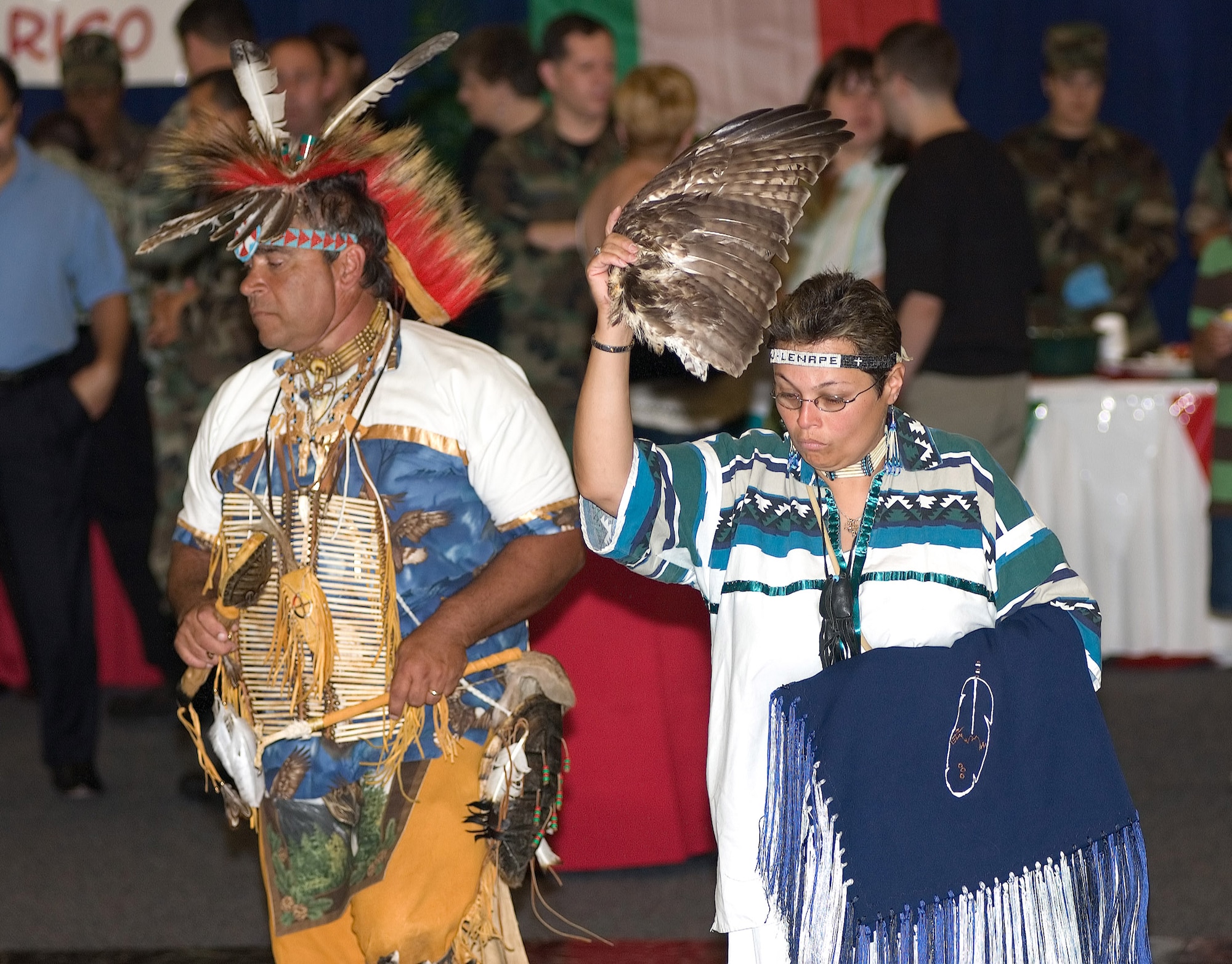 Bob "Little Eagle" Smith and Yvonne "Bright Sparrow" Gourley perform a Native American dance at the Multi-Cultural Expo at The Landings Club June 23. (U.S. Air Force photo by Jason Minto)

