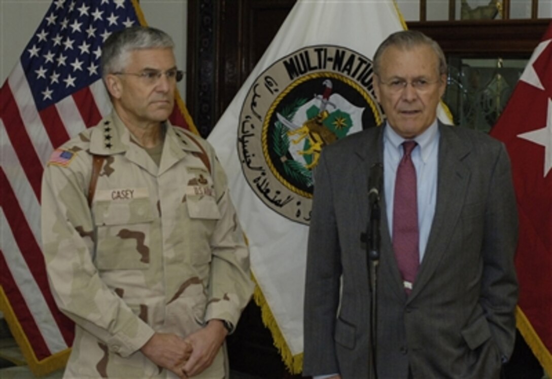 Secretary of Defense Donald H. Rumsfeld and Army Gen. George Casey, commanding general, Multi-National Force-Iraq, speak to the media after meeting at the U.S. Embassy in Baghdad, Iraq on April 26, 2006. 