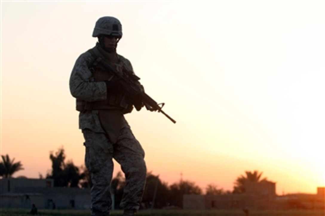 U.S. Marine Corps Lance Cpl. Erin M. Sundstrom conducts a patrol in Al Ish, Iraq, May 10, 2006. Sundstrom is assigned to Weapons Company, 1st Battalion, 7th Marine Regiment, 1st Marine Expeditionary Force (Forward). 