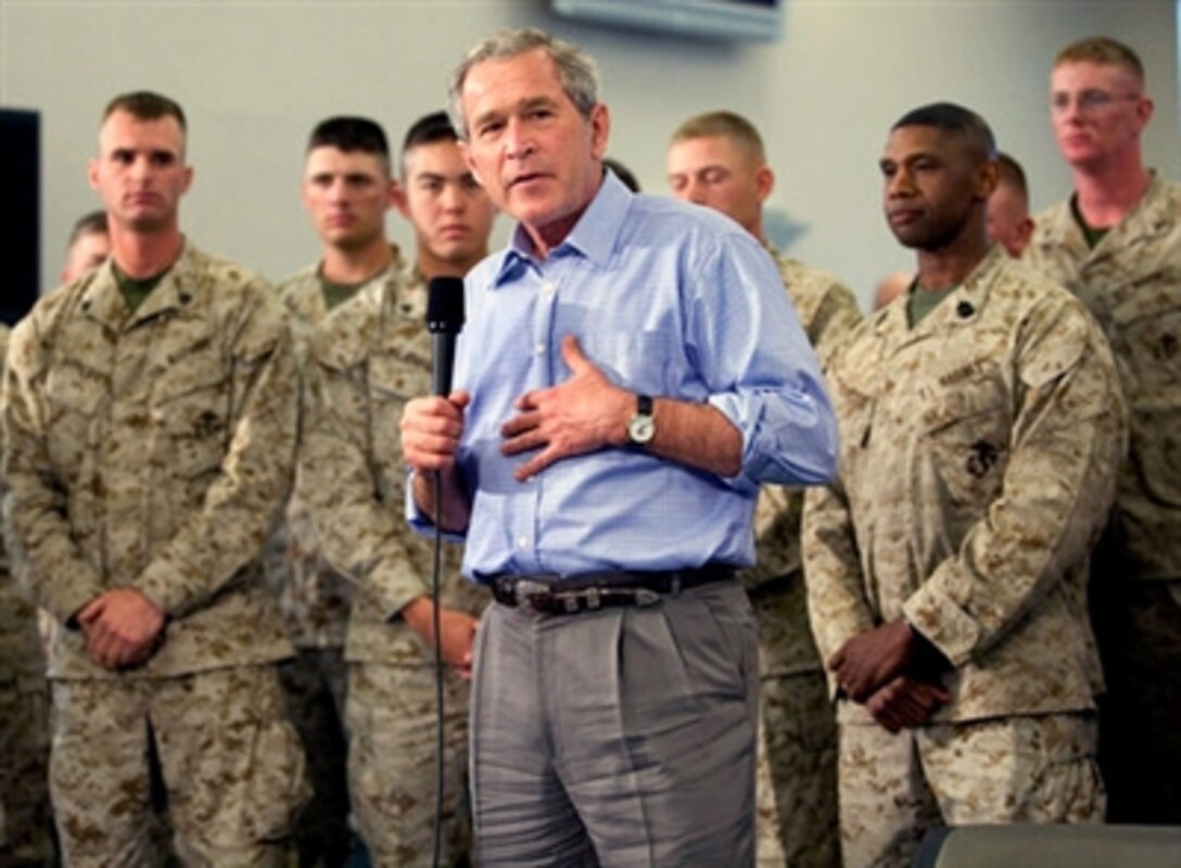 President George W. Bush speaks to Marines and their families following lunch inside the mess hall at the Marine Corps Air Ground Combat Center in Twentynine Palms, Calif., April 23, 2006. 