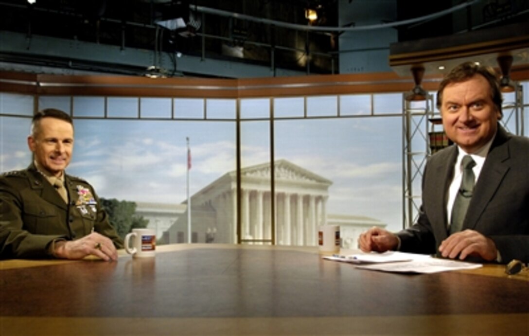 U.S. Marine Gen. Peter Pace, Chairman of the Joint Chiefs of Staff, is interviewed by Tim Russert, host of NBC's Meet the Press, at the NBC studio in Washington, D.C., March 5, 2006. 