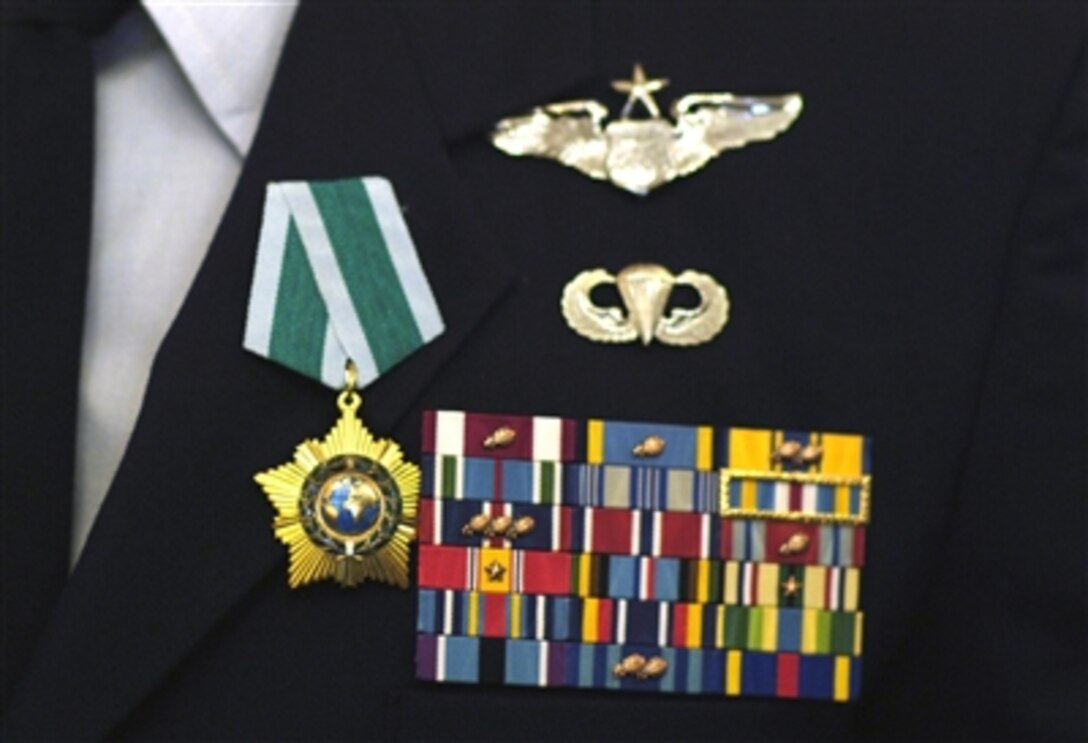 The Order of Friendship Medal is the highest honor awarded to non-Russian-citizens. It was presented to U.S. Navy Lt. Cmdr. Steven Smith and U.S. Air Force Maj. Patrick Poon at the Russian Embassy in Washington, D.C., Feb. 28, 2006. The officers were recognized for their actions associated with the rescue of the Russian submarine crew on Aug. 7, 2005. 