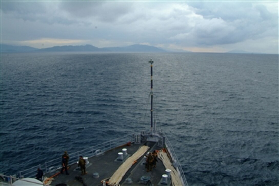 The amphibious dock landing ship USS Harpers Ferry transits the San Bernardino Strait Feb. 18, 2006, en route to the Island of Elite in the central Philippines. The Harpers Ferry and amphibious assault ship USS Essex are on their way to the area in support of humanitarian relief efforts for the victims of a devastating landslide that occurred Feb. 17, 2006. 