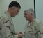 SOUTHWEST ASIA- Former 914th commander, Brig. Gen. Wade
Farris, pins the rank of full colonel onto Col. Mark Murphy, 328
AS, at a forward deployed location.