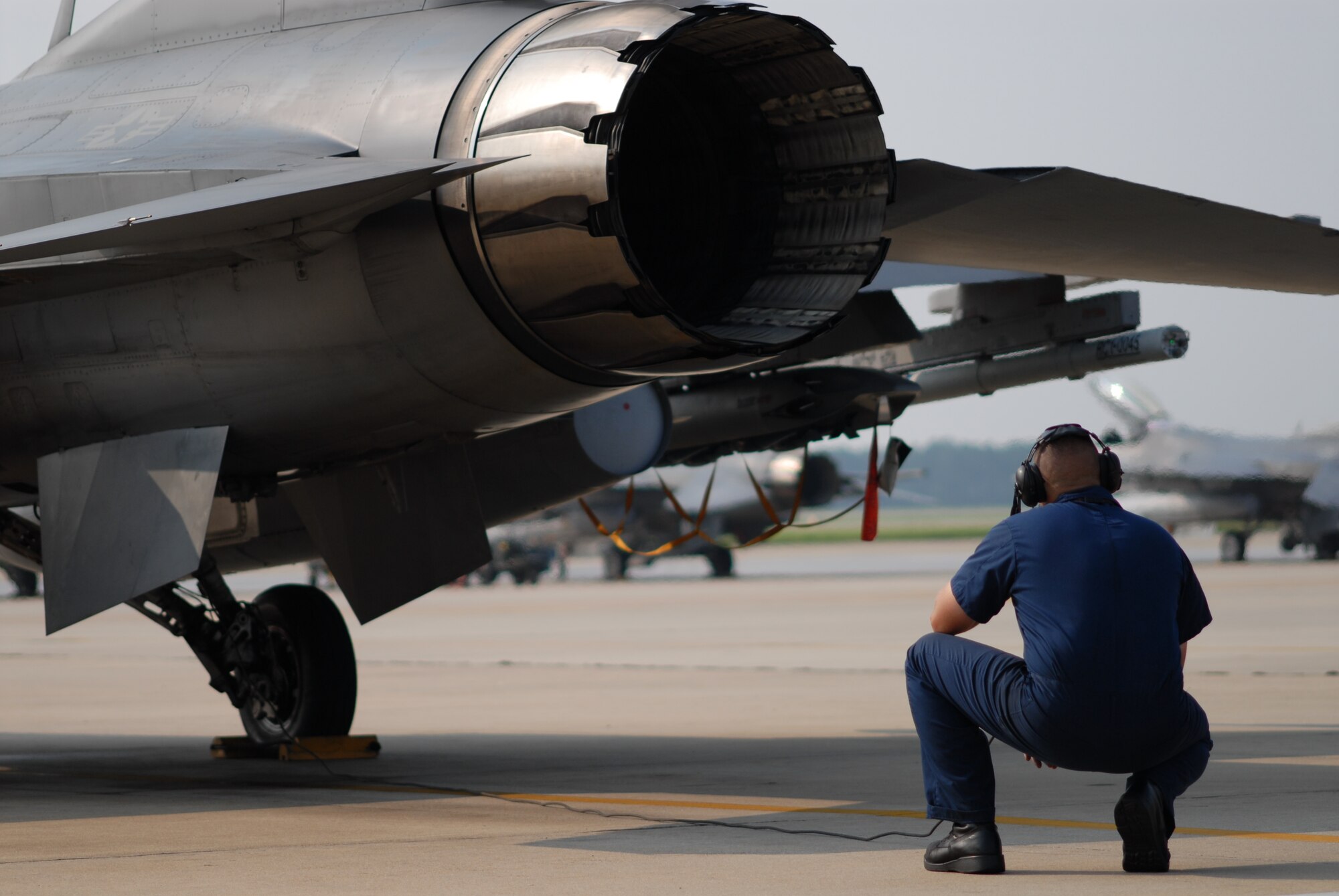 Staff Sgt. Brian Gaylor does a pre-flight check of an F-16 Fighting Falcon before a mission in support of Operation Dynamic Weasel on Thursday, June 29, at Shaw Air Force Base, S.C. The exercise features various aircraft imitating combat operations in Southwest Asia. Sergeant Gaylor is a crew chief with the 77th Fighter Squadron. (U.S. Air Force photo/Tech. Sgt. James Arrowood) 

