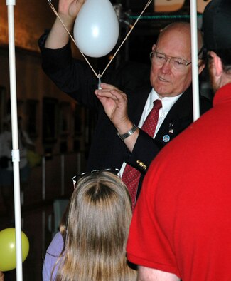 DAYTON, Ohio -- A volunteer at the National Museum of the United States Air Force demonstrates an aerospace principle during Family Day. (U.S. Air Force photo)