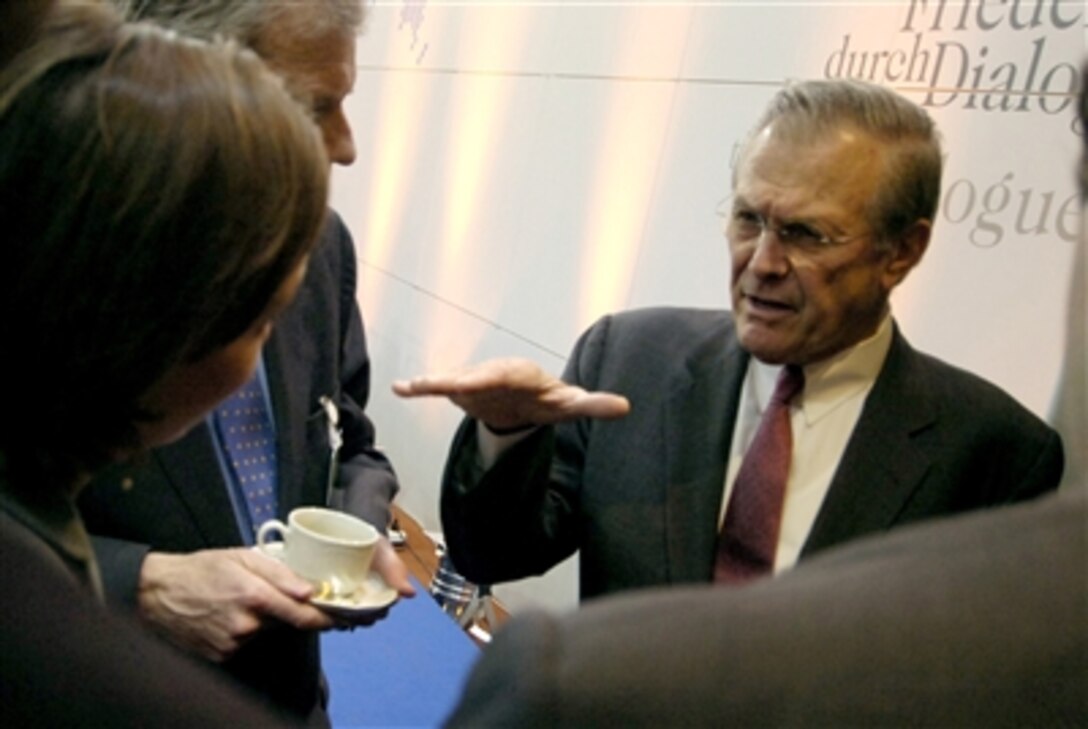 Defense Secretary Donald H. Rumsfeld speaks with attendees at the 42nd Munich Conference on Security Policy in Munich, Germany, Feb. 4, 2006. The conference was attended by more than 250 participants from over 50 countries, including 40 foreign and defense ministers.