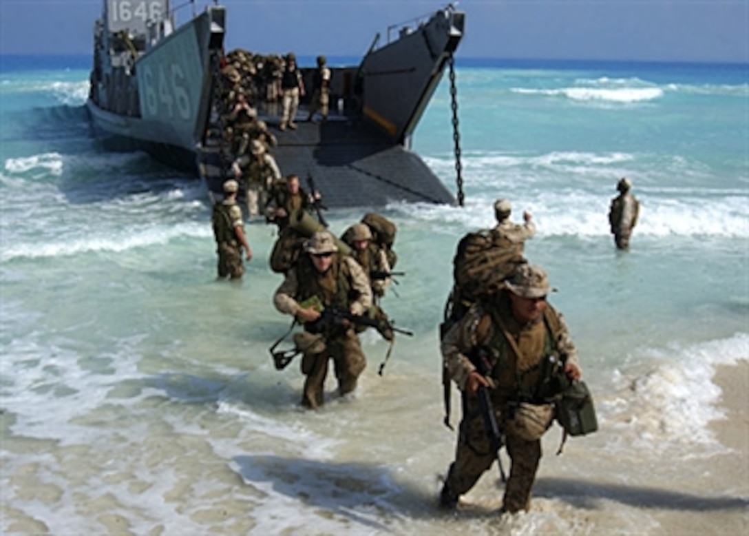 U.S. Marines from Expeditionary Strike Group 1, 13th Marine Expeditionary Unit disembark a landing craft utility ship from the amphibious assault ship USS Tarawa in preparation for an upcoming amphibious assault landing demonstration for Exercise Bright Star in Mubarek Military City, Egypt, Sept. 13, 2005. The multinational exercise, held every two years in Egypt, is the largest and most significant coalition military exercise conducted by U.S. Central Command.