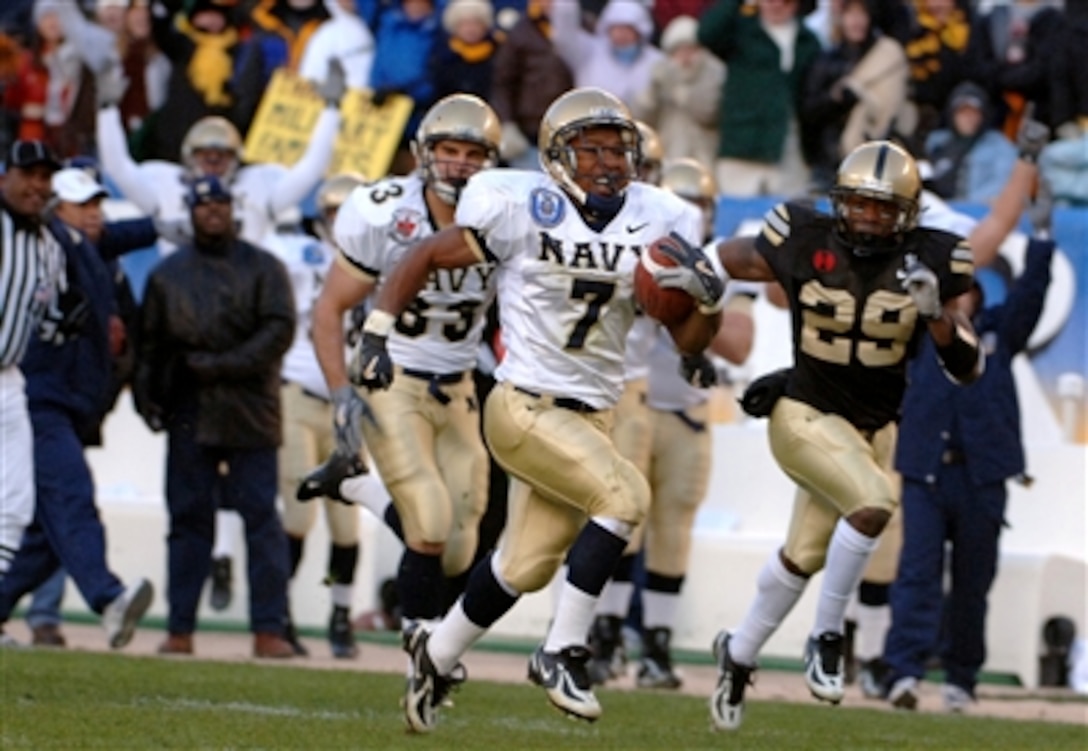 Navy running back Reggie Campbell runs for a touch down during second-quarter play of the 106th Army-Navy football game in Philadelphia. The midshipmen of the U.S. Naval Academy defeated the Cadets of the U.S. Military academy 42-23. This is the fourth year in a row in which Navy triumphed. 