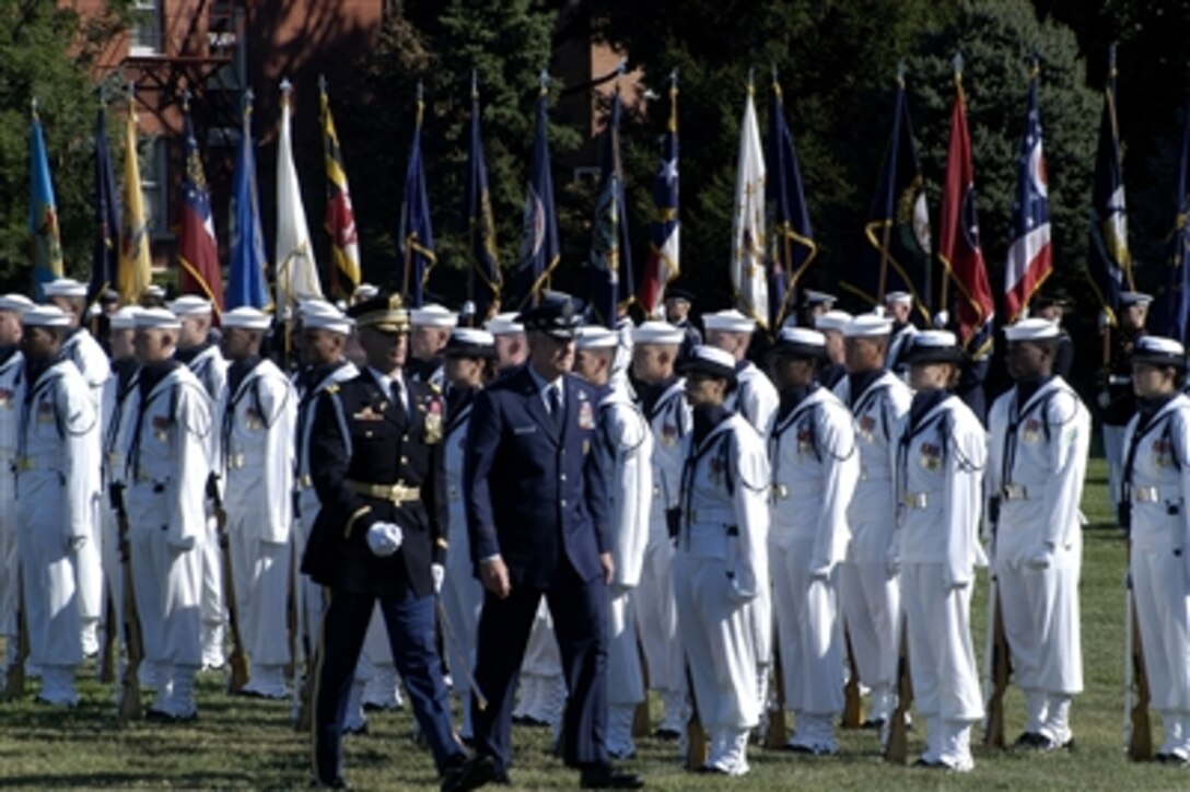 .S Air Force Gen. Richard B. Myers inspects the troops at the Armed Forces Farewell Tribute to him at Fort Myer, Va., Sept 30, 2005. Myers retired after 40 years of service as the 15th Chairman of the Joint Chiefs of Staff.