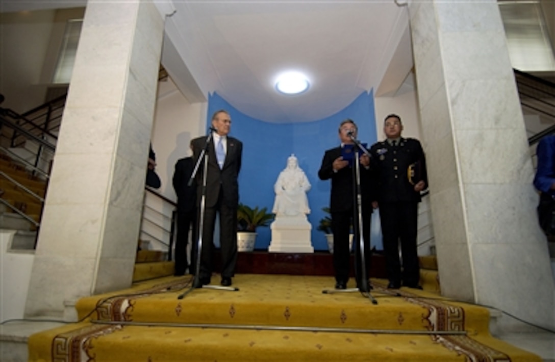 Defense Secretary Donald H. Rumsfeld and Minister of Defense Tserenkhuu Sharavdorj give their remarks during a press availability at Ulaanbaatar, Mongolia, Oct. 22, 2005. Rumsfeld arrived in Ulaanbaatar for meetings with senior military and civilian leaders to review U.S.-Mongolia defense relationships and express appreciation for Mongolia's support in the global war on terrorism.