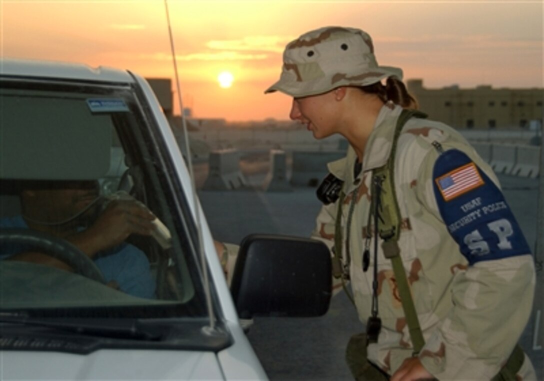 U.S. Air Force Airman 1st Class Christina Luksa ensures base security at the flightline in southwest Asia, Nov. 15, 2005. Luksa is in the 379th Expeditionary Security Forces Squadron. 