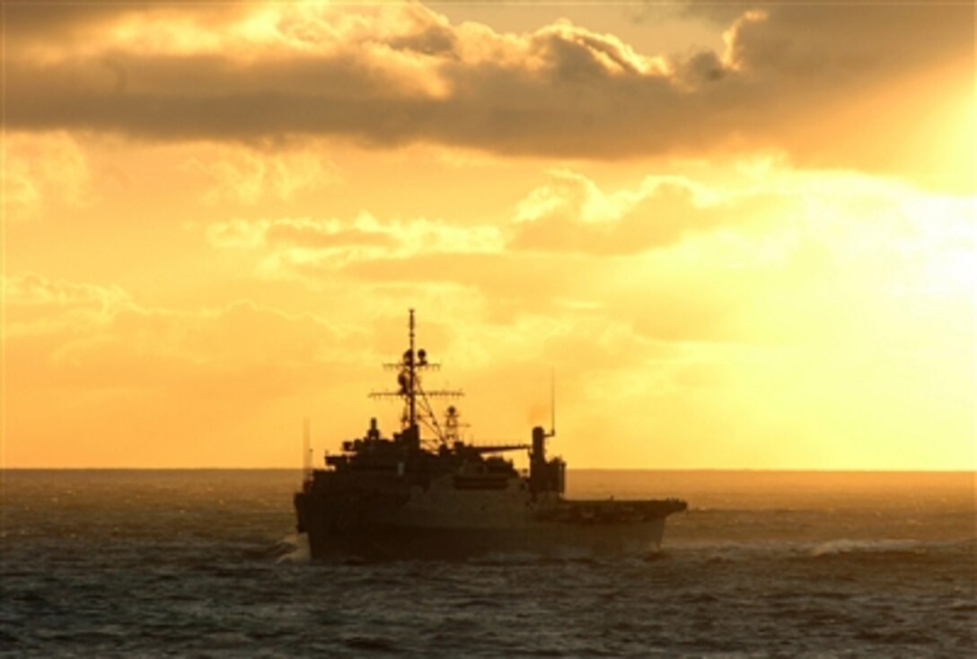 The amphibious transport dock ship USS Ogden, under way off the coast of Southern California, conducts a simulated straits transit, Jan. 15, 2006. The ship is conducting its joint task force exercise in preparation for an upcoming scheduled deployment.