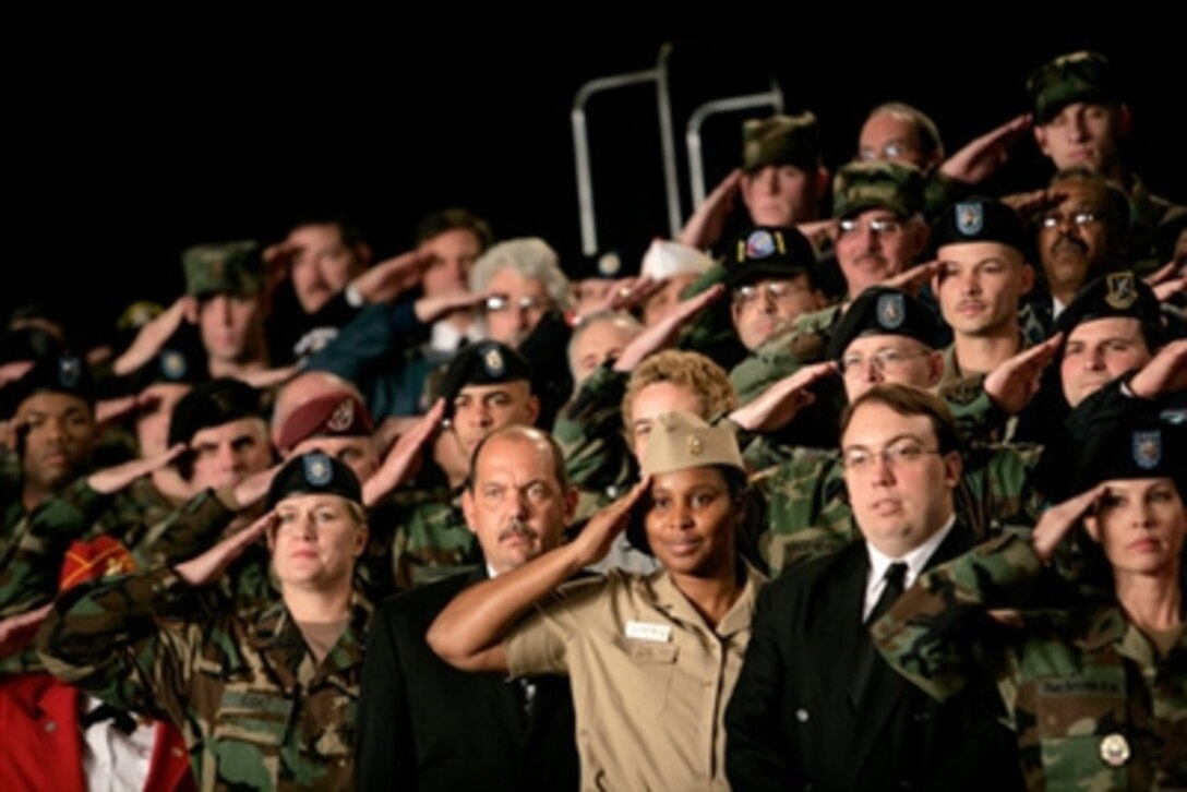 Staff and Army personnel welcome President George W. Bush, during his introduction, Friday, Nov. 11, 2005 at the Tobyhanna Army Depot in Tobyhanna, Pa. 
