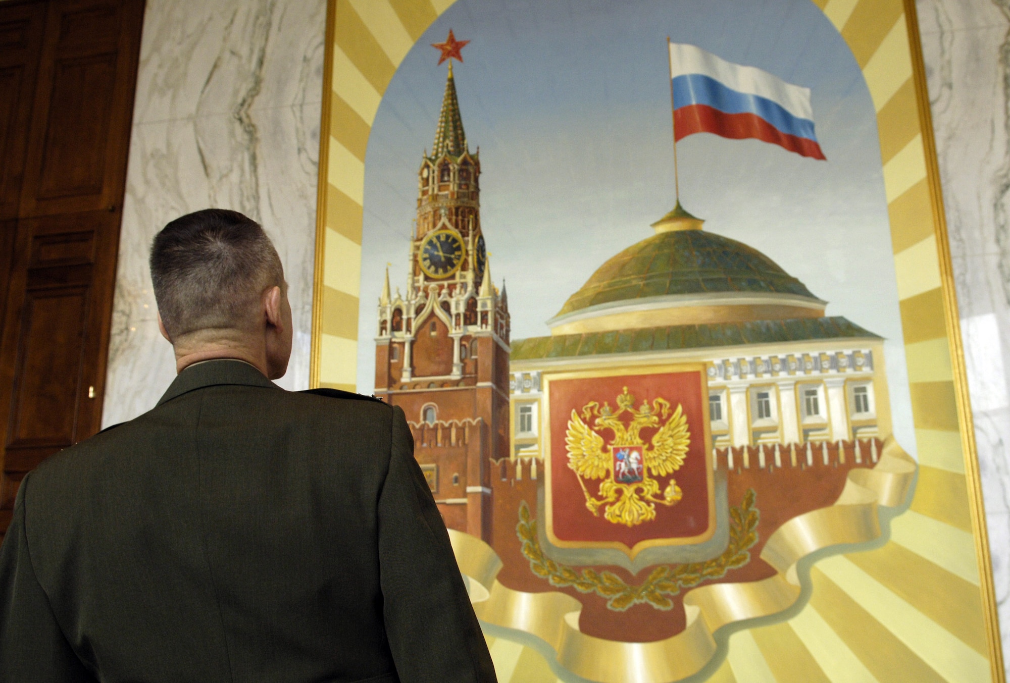 Gen. Peter Pace, chairman of Joint Chiefs of Staff, looks at a mural at the Russian Embassy in Washington, D.C., Tuesday, Feb. 28, 2006.  General Pace was at the embassy for the presentation of the Russian Order of Friendship Medal to Air Force Maj. Patrick Poon and Navy Lt. Cmdr. Steven Smith. They received the medal for their actions associated with the rescue of a Russian submarine crew Aug. 7. (Department of Defense photo/Staff Sgt. D. Myles Cullen)