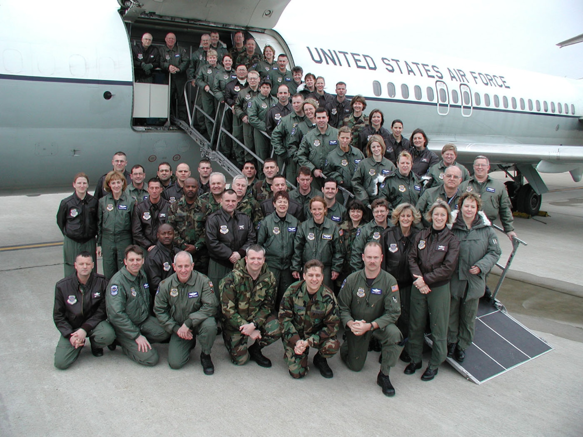 C-9A Nightingale pilots and crew members from the Air Force Reserve Command's 932nd Airlift Wing at Scott AFB, Ill., pose in front of a C-9A before its retirement. Photo by Capt. Stan Paregien.