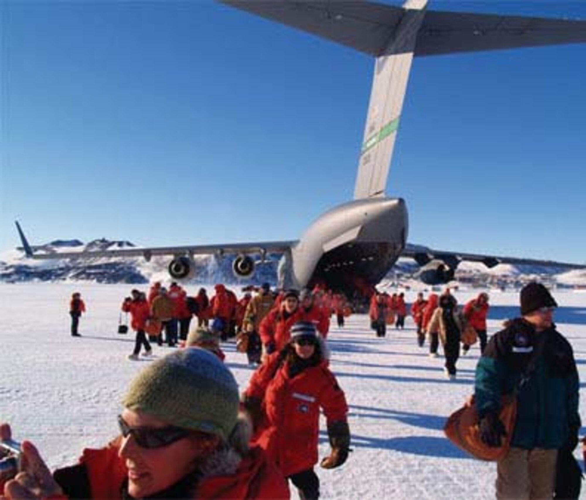 ANTARCTICA- U.S. Antarctica Program participants arrive at the Annual Sea Ice Runway at McMurdo Station, Ross Island, Antarctica. The C-17 jets are flown by 446th AIrlift Wing, an Air Force Reserve unit at McChord Air Force Base, Wash.,  in support of the U.S. Antarctic Program. (National Science Foundation courtesy photo by Andre Fleuette)