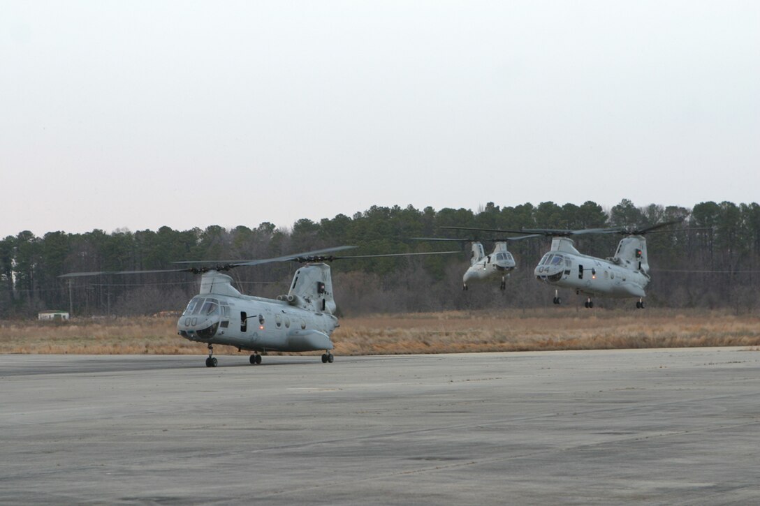 A group of CH-46E Sea Knights land aboard Fort Eustis, Va. as part of a raid exercise Mar. 1.  As the Air Combat Element of the 24th Marine Expeditionary Unit, HMM-365 (Rein.) performed the raid along with Marines from Battalion Landing Team 1st Battalion, 8th Marine Regiment, Alpha Company during their Training in an Urban Environment exercise held in Norfolk, Va.