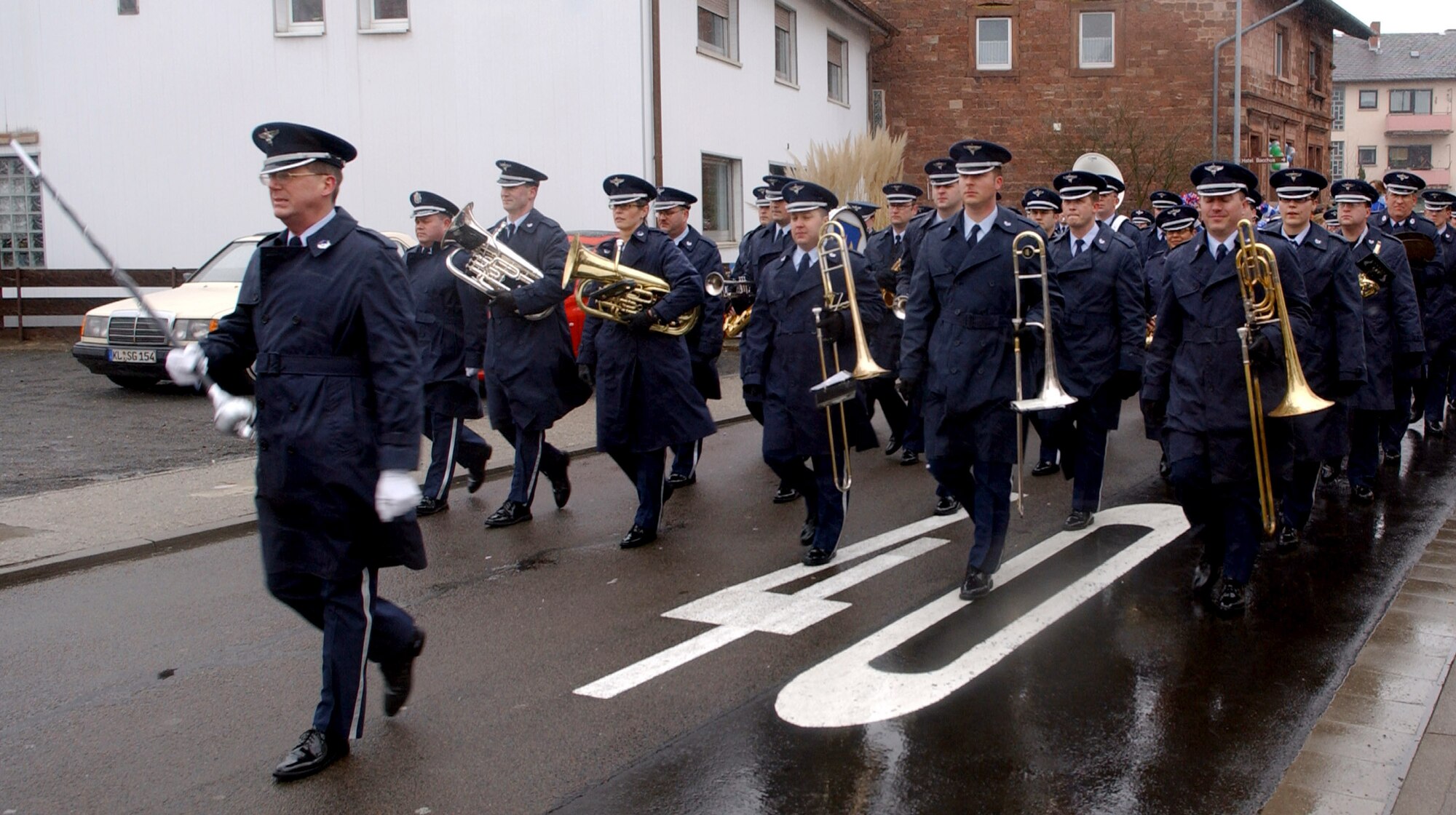 U.S. Air Forces in Europe Band members participate in the local Fasching Parade in Ramstein Village, Germany, on Tuesday, Feb. 28, 2006. The parade was initially named and reserved for the Tuesday before Ash Wednesday. "Fastnacht" is the last celebration before the season of Lent. (U.S. Air Force photo/Airman 1st Class Erin M. Peterson)