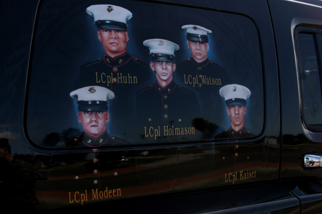 Karla Comfort had her son, 20-year-old Lance Cpl. John M. Holmason, and nine other Marines with F Company, 2nd Battalion, 7th Marine Regiment, 1st Marine Division, painted on a 2006 Hummer H3. The Marines were all killed by the same improvised explosive devise blast in Fallujah, Iraq, in December. Comfort visited Camp Pendleton and displayed the rolling memorial March 2. The custom paintjob, which was done by artist Robert Powell with AirbrushGuy & Co. in Benton, Ark., and took 250 man-hours to complete, was a way for Comfort to pay tribute to her son and keep his memory alive.