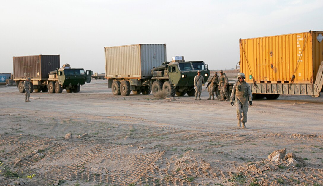 Supply convoys such as these are common occurrences throughout Iraq?s Al Anbar Province. Such missions are conducted by servicemembers of the 1st Marine Logistics Group, which is relieving the 2nd MLG as they complete a 12-month tour in Iraq. The 4,000 joint-service members of the 1st MLG are part of the 25,000 Marines, sailors, soldiers and airmen of the 1st Marine Expeditionary Force?s forward deployed element. The 1st MLG?s mission is to provide sustained logistical support to I MEF and Iraqi Security Forces operating in the Al Anbar Province. First MLG will also support the development of Iraqi Security Forces? logistical capabilities in order to enable independent ISF-led counterinsurgency operations.