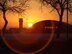 WINTER SUNRISE -- The morning sun peeks over Hangar 3 in this Jan. 13 photo. An unusually mild winter included more rain than snow by mid-February. Pictured to the left is the control tower, completed in April 2003. It stands 123 feet tall. Hangar 3 is one of five hangars built in 1940 that align the flight line. The hangars were once large enough to hold Air Force aircraft built in the 1940s and 50s. The buildings now store vehicles and equipment and include offices and training areas. The larger fuel cell and pull-through hangars are used for indoor C-5 maintenance operations.
(U.S. Air Force photo/Tech Sgt. Andrew Biscoe)