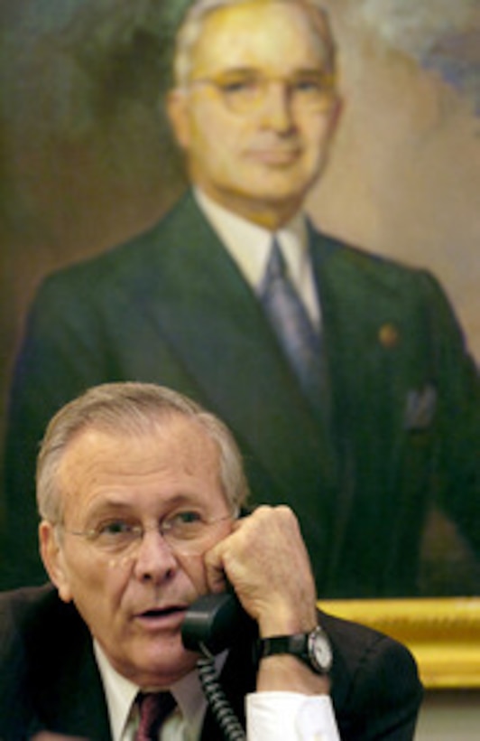 Secretary of Defense Donald H. Rumsfeld is interviewed over the phone by KMBZ 980 radio personality Jerry Agar during a visit to the Harry S. Truman Presidential Museum & Library in Independence, Mo., on March 2, 2006. Rumsfeld is at the Library to speak to supporters of the Truman Library Institute about the global war on terrorism. 