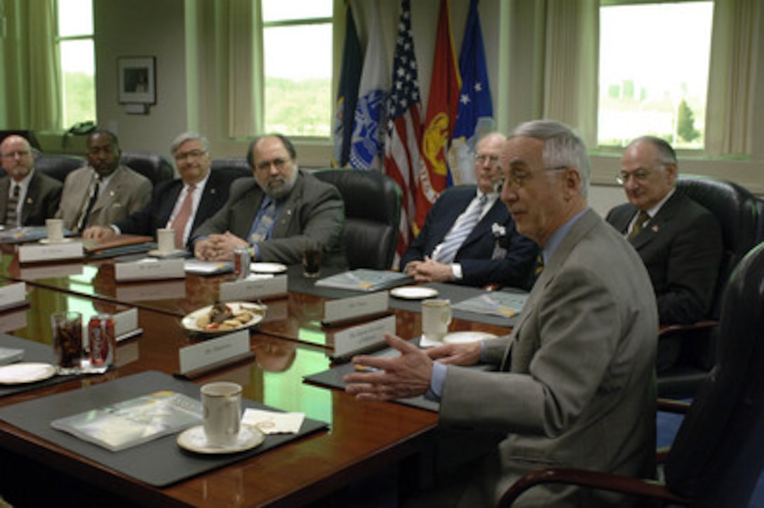 Deputy Secretary of Defense Gordon England meets with members of the National Industrial Base Workforce Coalition in the Pentagon in Arlington, Va., on March 3, 2006. 