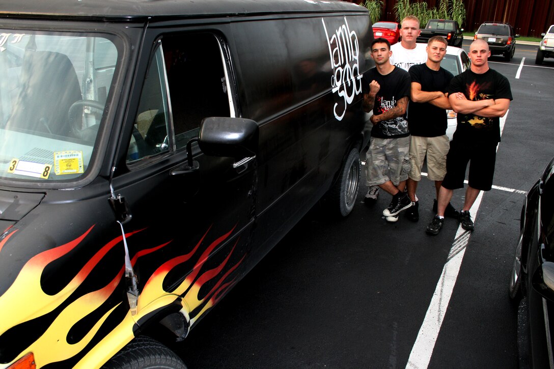 (From left to right) Cpl. William Sawin, Pfc. Nathan Patten, Cpl. Jacob Sylvester and Lance Cpl. Joseph Rac all from Marine Aerial Refueler Transport Squadron 252 tailgate, just before going into the House of Blues in Myrtle Beach, S.C., for a Lamb of God concert. Sawin custom painted his van in honor of a few of his favorite bands, including Lamb of God.