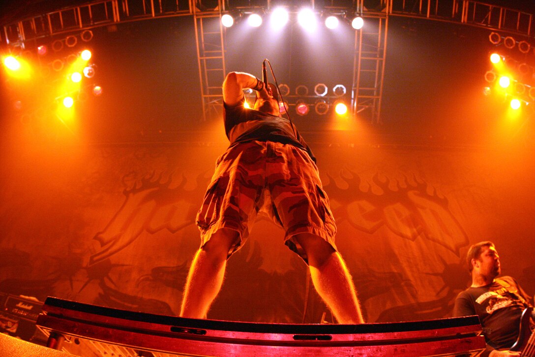 Jamey Jasta of Hatebreed stands tall while screaming the lyrics of a song. Hatebreed, 3 Inches of Blood and Lamb of God honored service members during a concert at the House of Blues in Mrytle Beach, S.C., Aug 31.