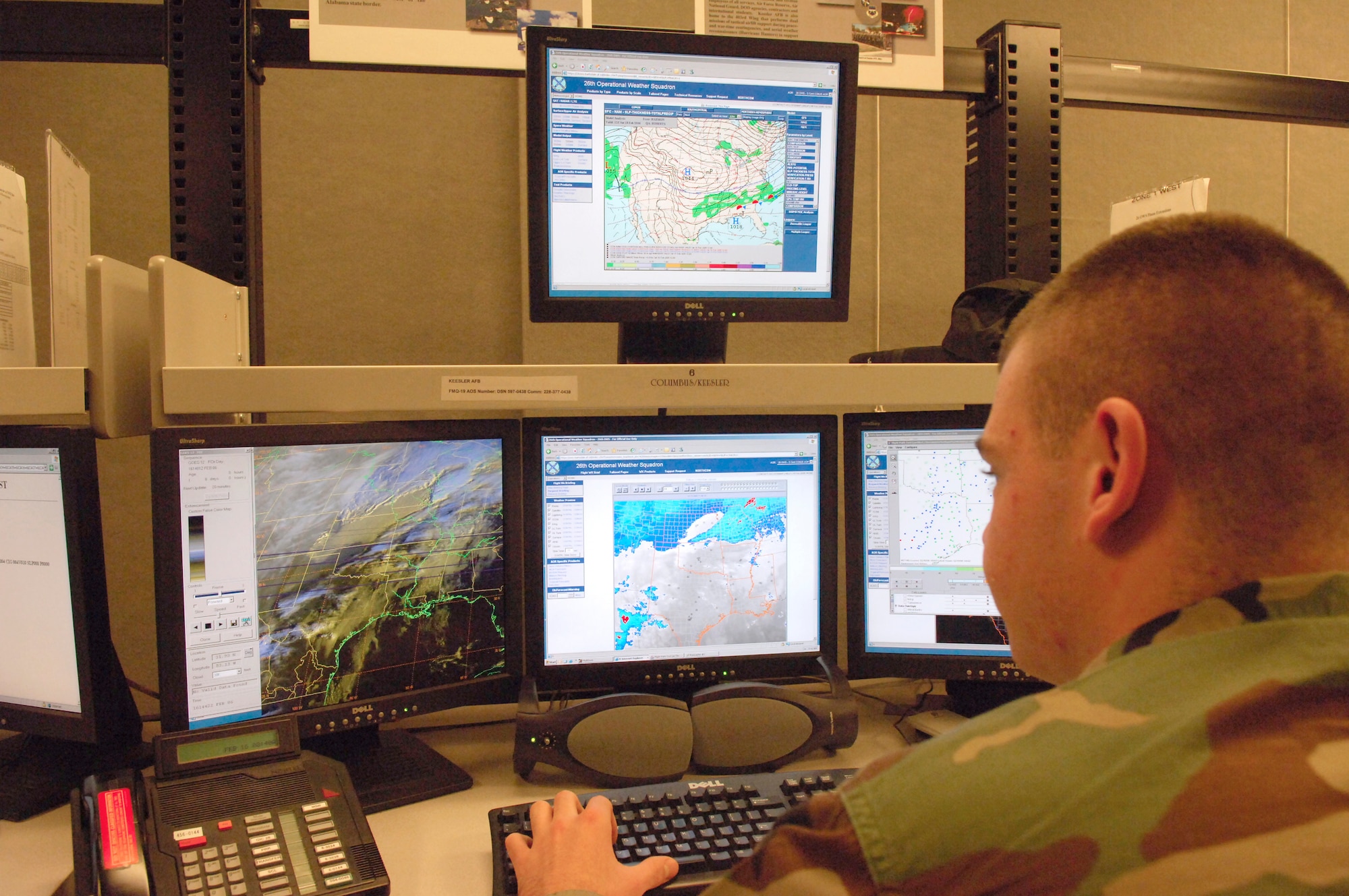 Airman Eric Reichwaldt observes weather data to help predict situations that might affect the Air Force mission. Computers show information about weather patterns for a more accurate weather forecast.   He is a regional forecaster apprentice with the 26th Operational Weather Squadron.  (U.S. Air Force photo/Senior Airman Stephen Otero)