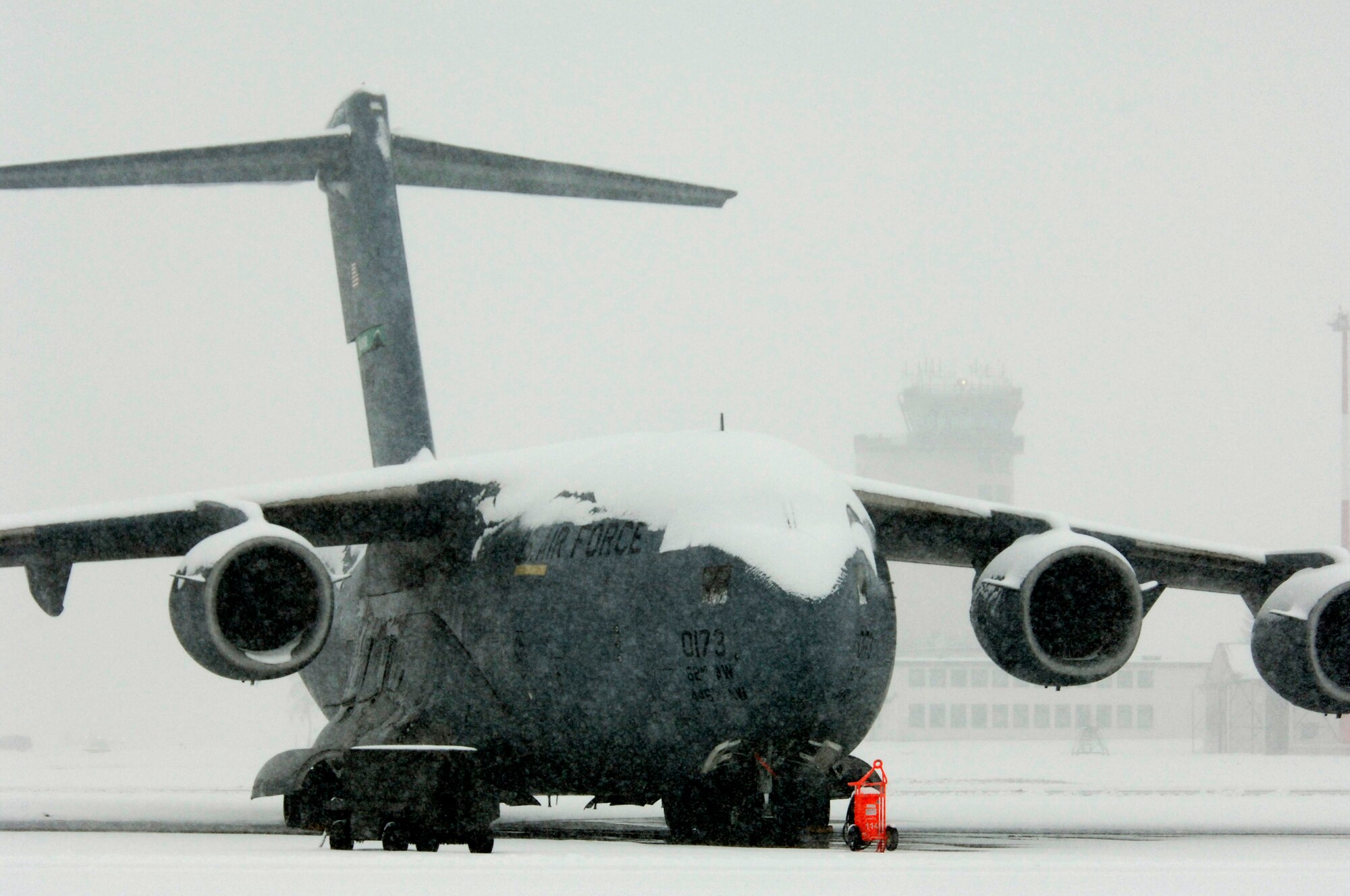 Several days of storms left 6 inches of snow covering C-17 Globemaster IIIs at Ramstein Air Base, Germany, on Friday, March 3, 2006. (U.S. Air Force photo/Master Sgt. John E. Lasky)