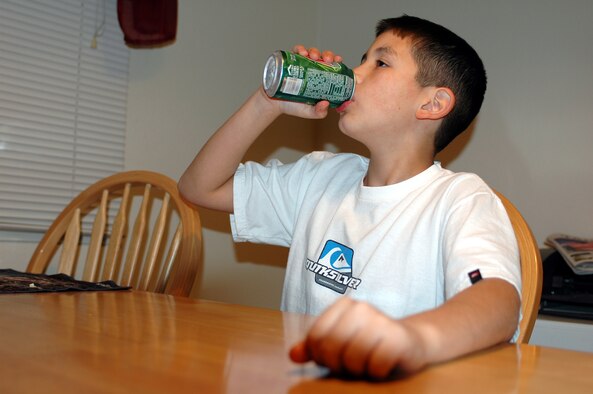 Drinking large amounts of soda can cause dental caries, ademineralization of dental hard tissues caused by the acid by product of the bacterial fermentation of dietary sugars. (U.S. Air Force photo by Staff Sgt. Matt McGovern)

