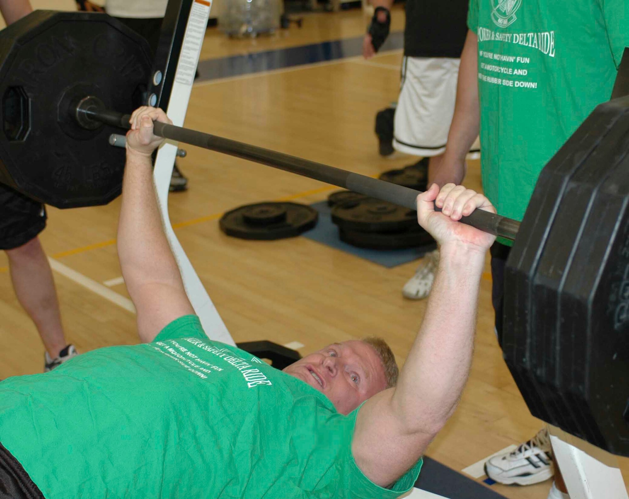 Maj. Charles Nesemeier, 60th Equipment Maintenance Squadron team member, successfully benches 350 pounds during the Fitness Center hosted bench press competition Feb. 24. The 60th EMS team came in first with combined team total of 2,830 pounds benched.  (U.S. Air Force photo by Staff Sgt. Matt McGovern)