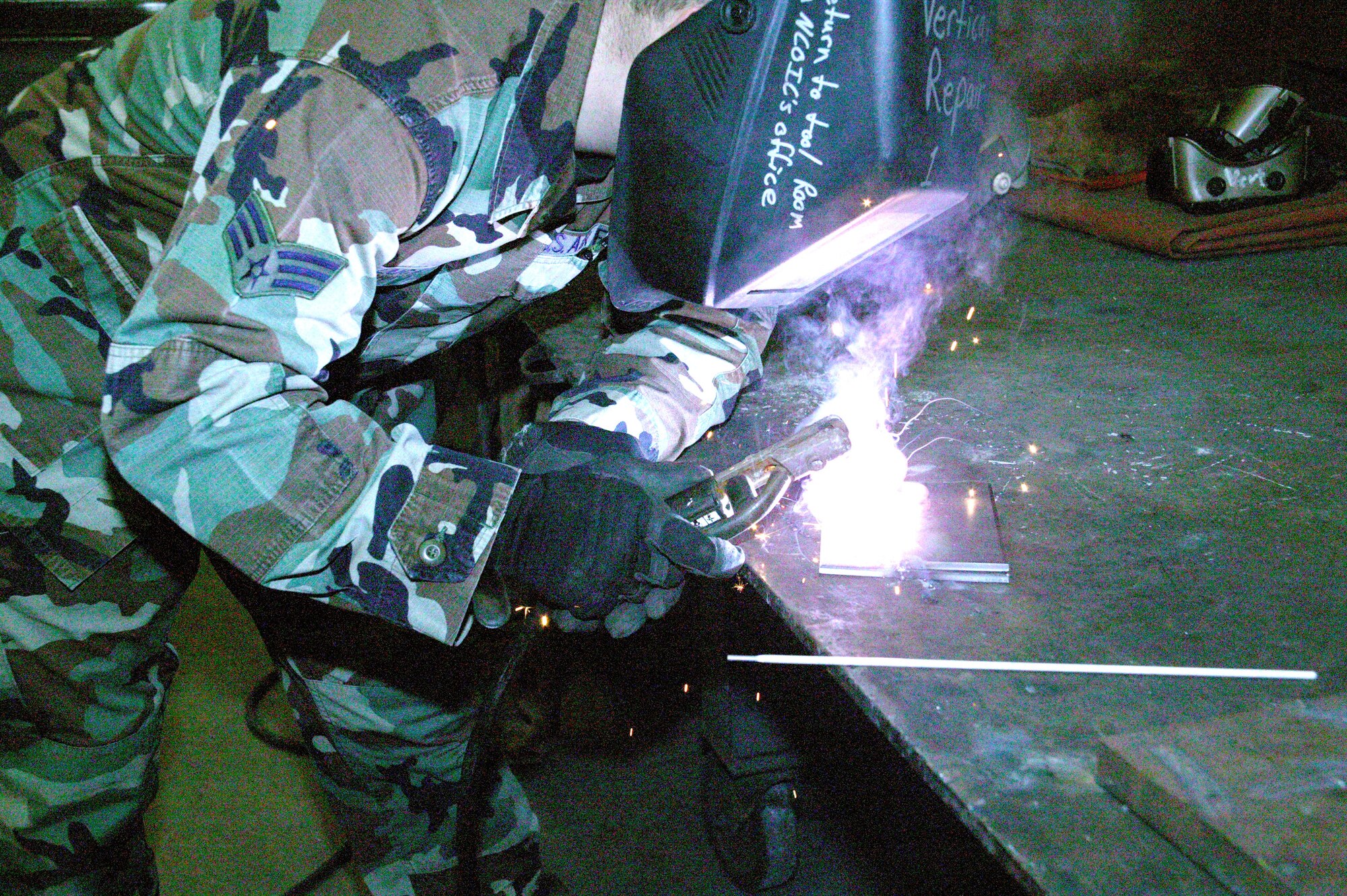 Senior Airman Luke Lucas arc welds two pieces of metal in the 20th Civil Engineer Squadron's vertical shop at Shaw Air Force Base, S.C. (U.S. Air Force photo/Senior Airman Joel Mease) 



