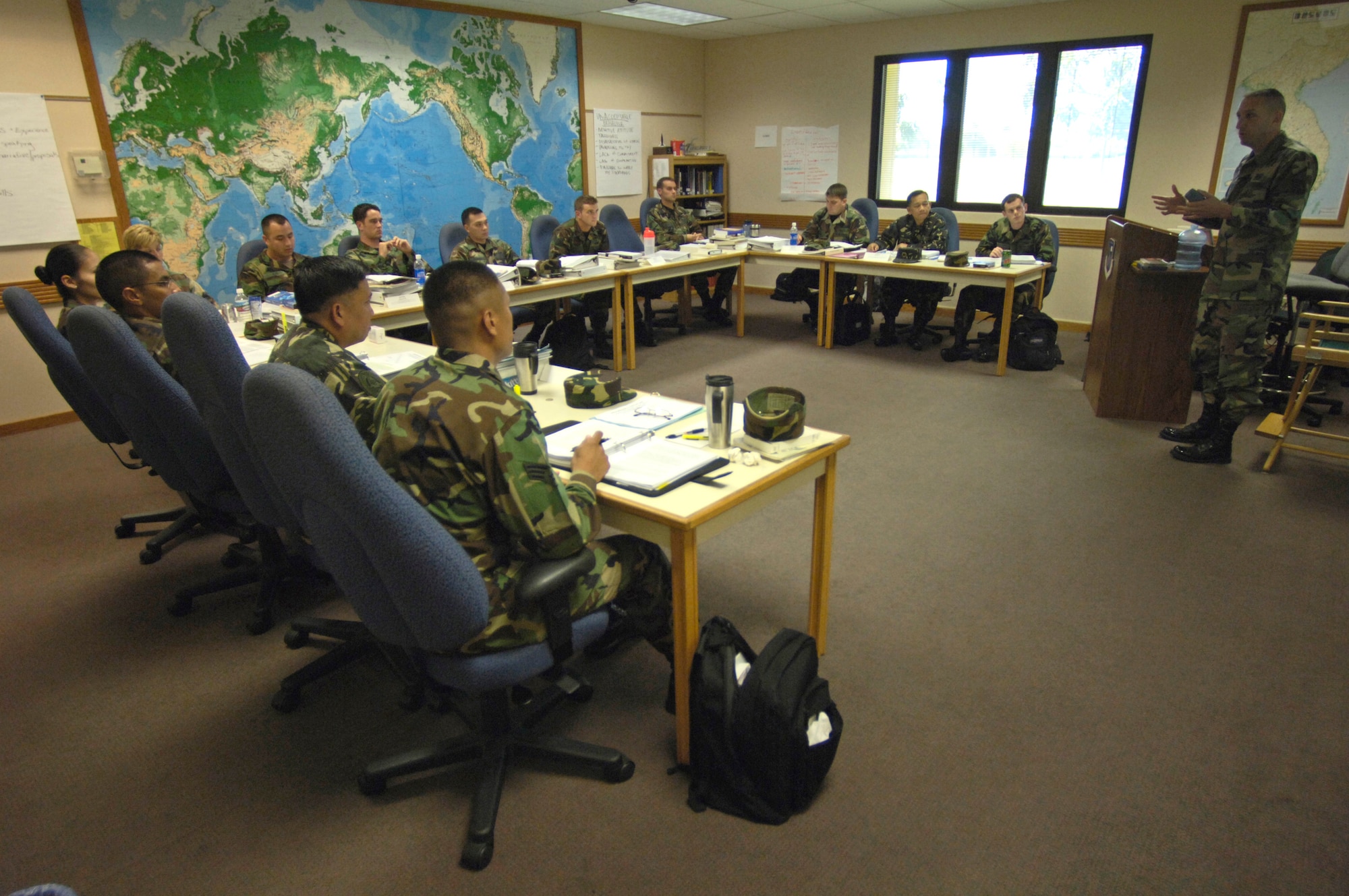HICKAM AIR FORCE BASE, Hawaii -- Master Sgt. Todd Joiner lectures on enlisted feedback during an Airman Leadership School class Tuesday, March 7, 2006, at Hickam Air Force Base, Hawaii. This class marks the first time Philippine Air Force students are attending the course. They will take back the lessons learned and develop their own leadership course within the Philippine Air Force. Sergeant Joiner is an instructor at the Hickam Professional Military Education Center.