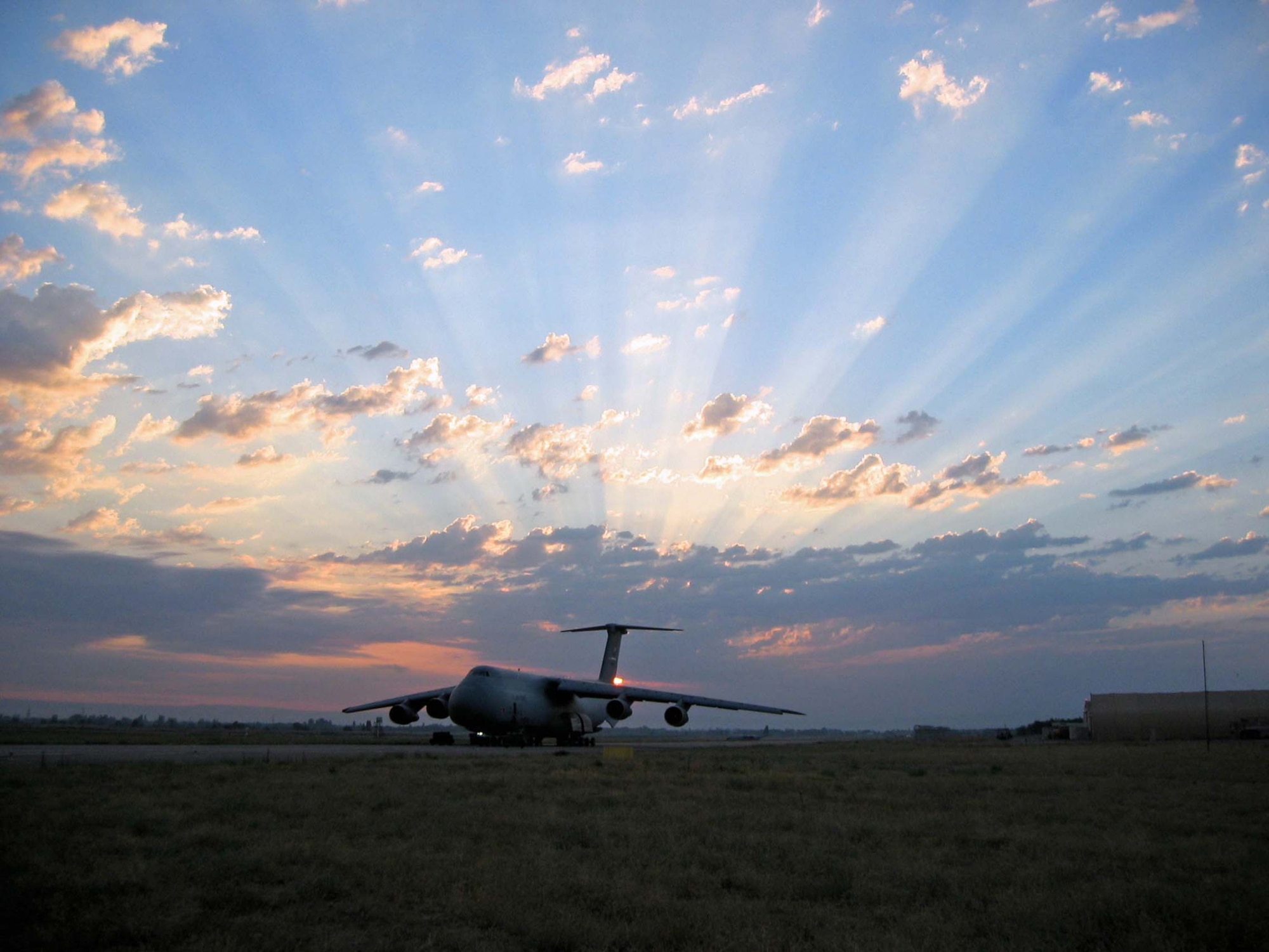 A C-5 from the Air Force Reserve Command's 433rd Airlift Wing at a deployed location gets ready to depart on another mission in support of Operation Iraqi Freedom. (US Air Force Photo by Capt. Jeremy Angel, 357th Airlift Squadron)