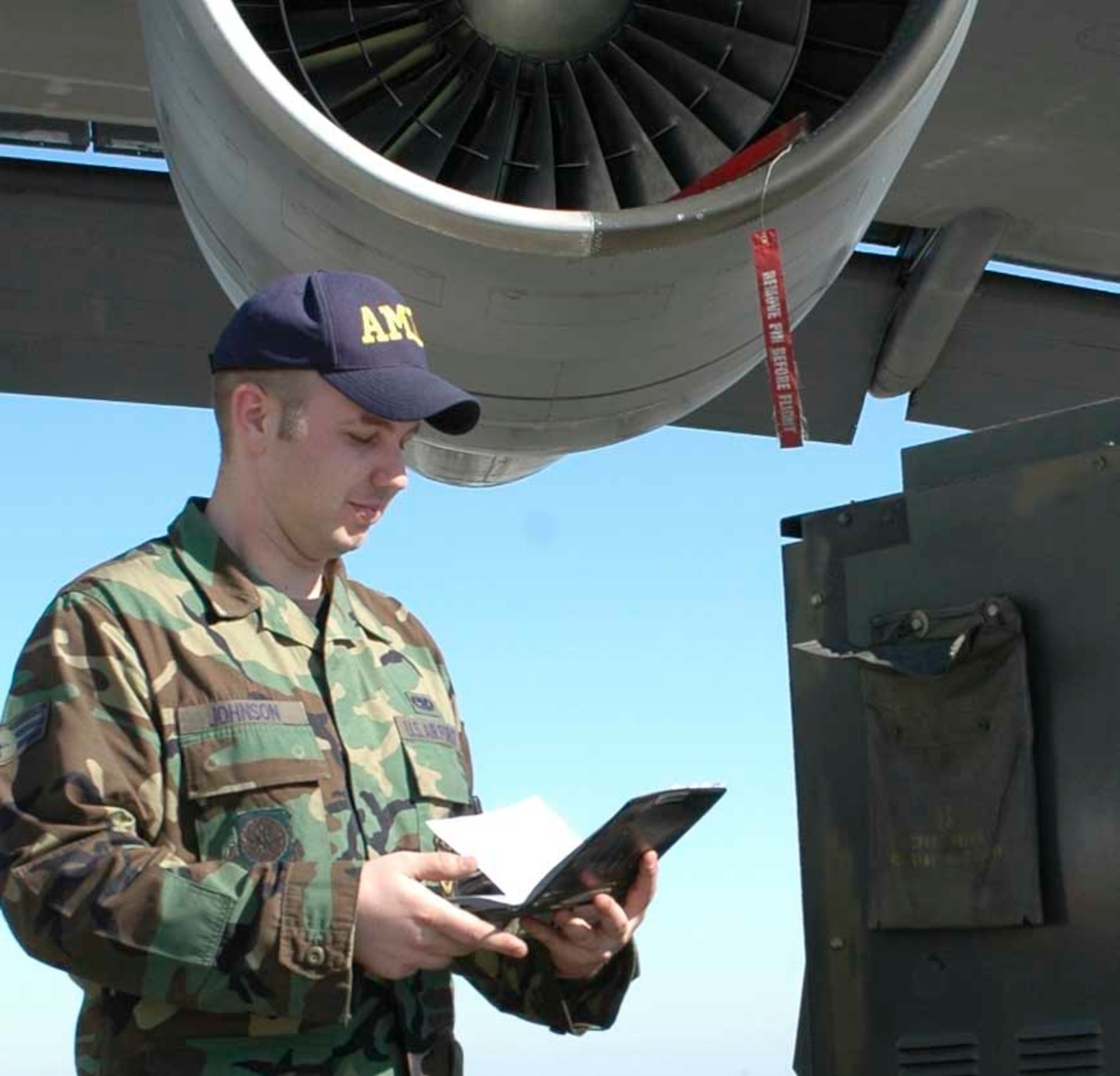 Senior Airman Kevin Johnson, 60th Aircraft Maintenance Squadron C-5 crew chief, prepares to inspect a power unit on the flightline. (U.S. Air Force photo by Staff Sgt. Matt McGovern) 