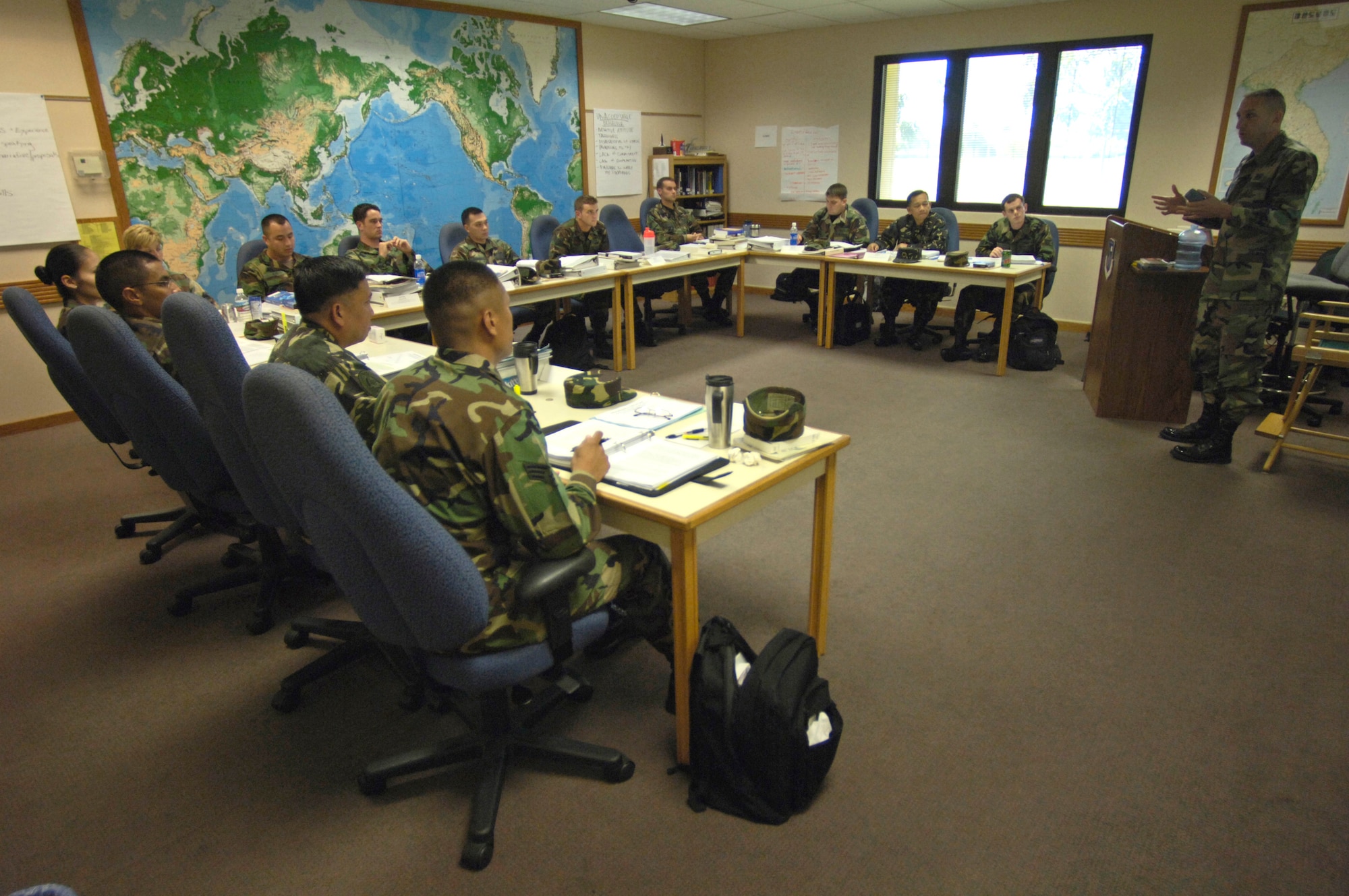 Master Sgt. Todd Joiner lectures on enlisted feedback during an Airman Leadership School class Tuesday, March 7, 2006, at Hickam Air Force Base, Hawaii. This class marks the first time Philippine Air Force students are attending the course. They will take back the lessons learned and develop their own leadership course within the Philippine Air Force. Sergeant Joiner is an instructor at the Hickam Professional Military Education Center. (U.S. Air Force photo/Tech. Sgt. Shane A. Cuomo) 