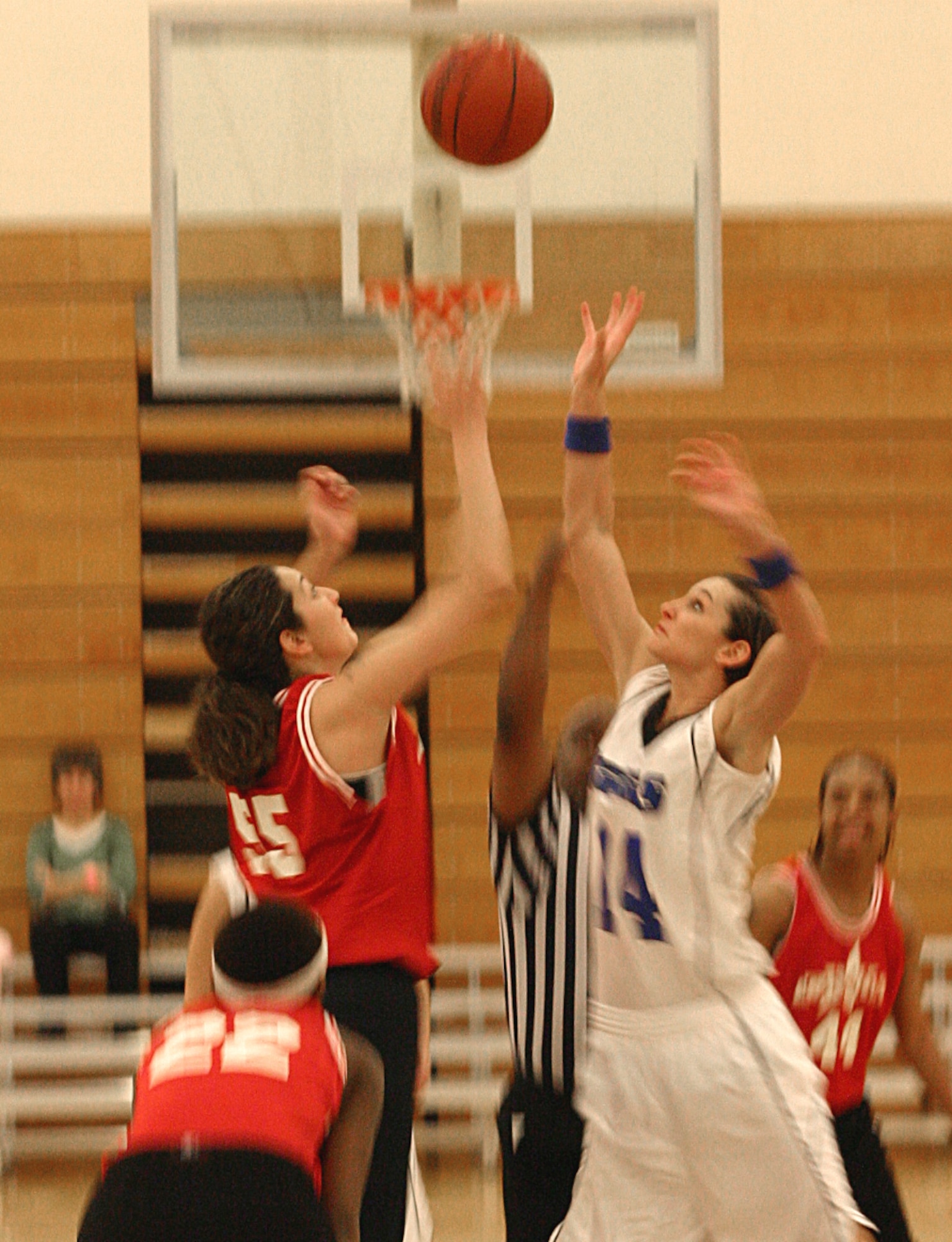 CANNON AIR FORCE BASE, N.M. -- Cannon's Elizabeth Leon and Lackland's Lacey Childers start the varsity women's basketball game Sunday. The Cannon Warriors upset the Lackland Warhawks with a 66-29 win. (U.S. Air Force photo by Airman Thomas Trower)