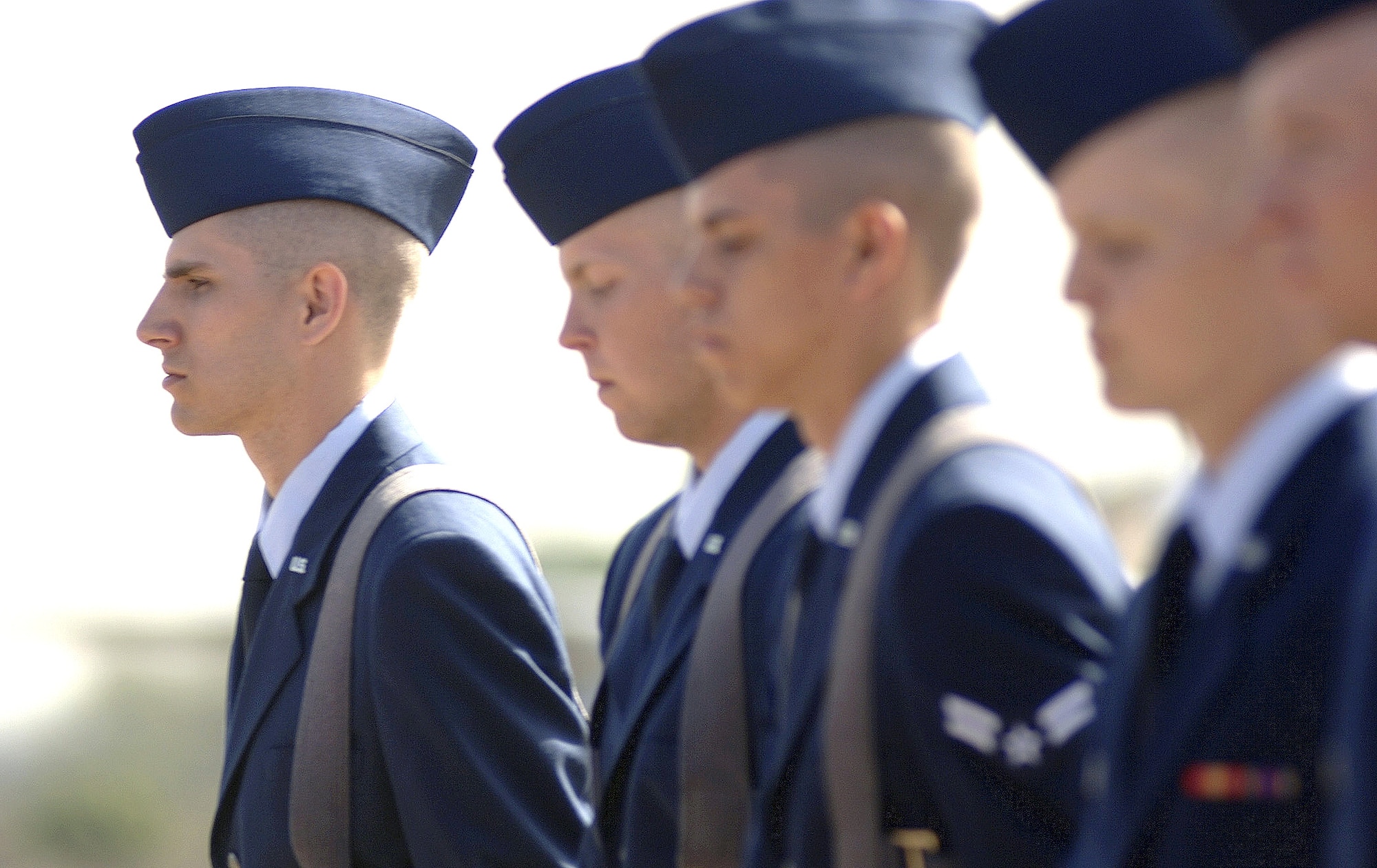 Airman Basic Lance Bowes marches alongside his fellow trainees during his basic training graduation parade at Lackland Air Force Base, Texas, Friday, March 10, 2006. Airman Bowes was assigned to the 322nd Training Recruit Squadron Flight 235. (U.S. Air Force photo/Tech. Sgt. Cecilio Ricardo) 