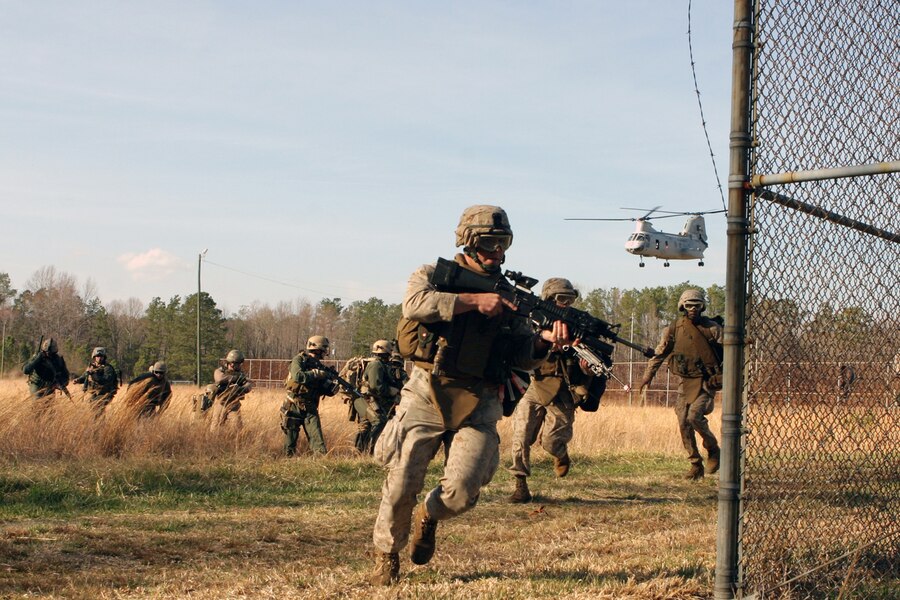 Maritime Special Purpose Force Marines with the 24th Marine Expeditionary Unit insert at a raid site March 10, 2006.  The raid was part of the 24th Marine Expeditionary Units Training in an Urban Environment, or TRUEX, taking place in the Hampton Roads, Va., area.