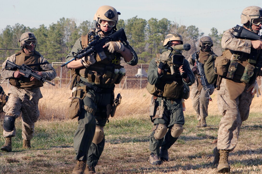 Maritime Special Purpose Force Marines with the 24th Marine Expeditionary Unit insert at a raid site March 10, 2006.  The raid was part of the 24th Marine Expeditionary Units Training in an Urban Environment, or TRUEX, taking place in the Hampton Roads, Va., area.