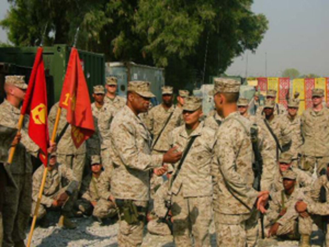 ?Brig. Gen Anthony Jackson, Deputy Commanding General, U.S. Marine Corps Forces, Central Command, met March 12 with Marines of First Battalion, Third Marine Regiment at Jalalabad Airfield in Afghanistan.  While there he presented several of them with MARCENT coins for their excellent performance.  The ?Lava Dogs? of First Battalion, Third Marines recently deployed to Jalalabad, Afghanistan from their home base at Marine Corps Base, Kaneohe Bay, Hawaii.?