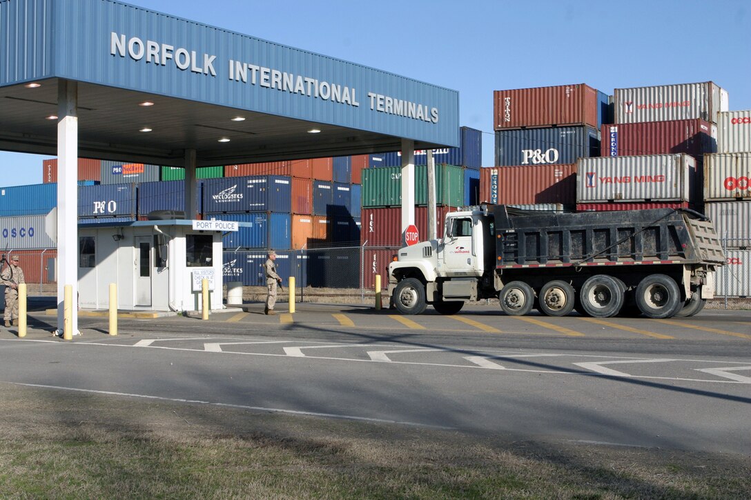 Marines with Alpha Company 1st Battalion, 8th Marine Regiment, Battalion Landing Team 24th Marine Expeditionary Unit provide security at a port facility March 11. The training was part of the 24th MEU's Training in an Urban Environment Exercise taking place in Hampton Roads, Va.