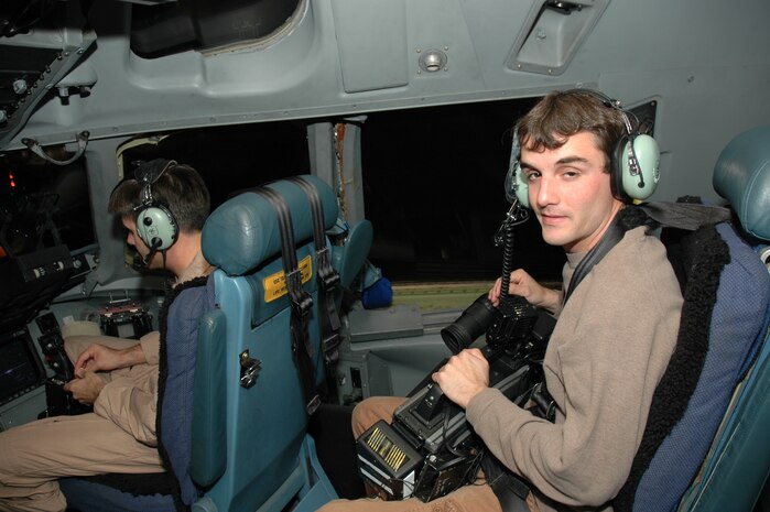 WCBD-TV (News Channel 2) Photojournalist, Jonah Jabbour waits to take off in a C-17 Globemaster III.  Jabbour and reporter Warren Peper flew with the 300th Airlift Squadron, Charleston AFB, S.C. as they departed for Germany and Iraq.  WCBD accompanied the 315th Airlift Wing on a trip to feature deployed members of the wing.  (Photo by 1st Lt Wayne Capps, USAFR)