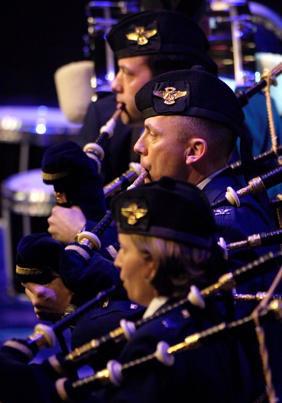 Members of the Air Force Reserve Pipe Band from Robins Air Force Base, Ga., perform with the US Air Force Band capping off its 40th anniversary season of their guest artist series, Sunday, Mar. 5, 2006, in Washington, D.C. Also performing at the concert was country music star Mark Wills. (U.S. Air Force photo/Master Sgt. Jim Varhegyi)