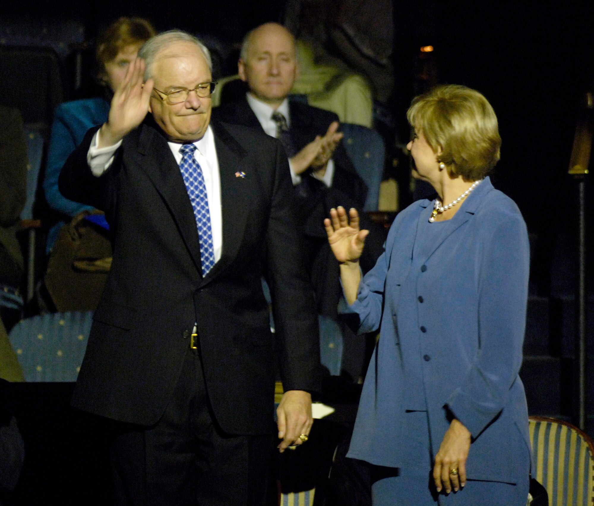Secretary of the Air Force Michael W. Wynne is introduced at the start of the US Air Force Band's final concert of this season's guest artist series, Sunday, Mar. 5, 2006, in Washington, D.C. The Air Force band capped off its 40th anniversary of hosting the series by performing with country music star Mark Wills, along with the Air Force Reserve Pipe Band from Robins Air Force Base, Ga. (U.S. Air Force photo/Master Sgt. Jim Varhegyi)